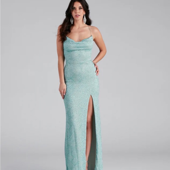 This is a formal gown from Windsor, it is in the color “Sea Foam” and a size XS. - Picture 1 of 2